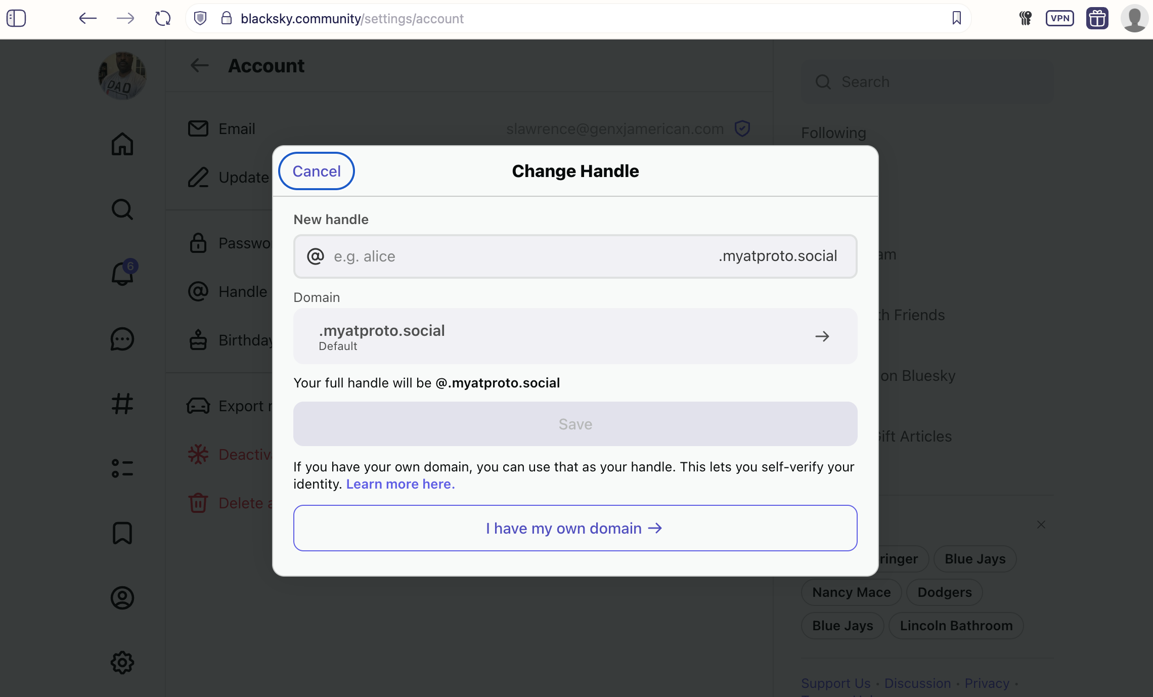 Auto-generated description: A dialog box titled Change Handle displays options for entering a new handle and domain on a website’s account settings page.